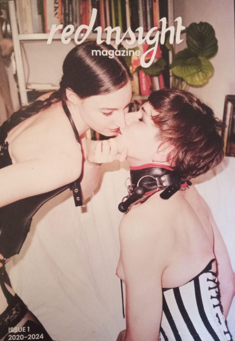 The cover of the red insight magazine showing two white people kissing